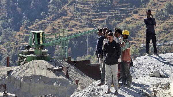 Digging to rescue 41 workers trapped in tunnel in India hit by mechanical issue